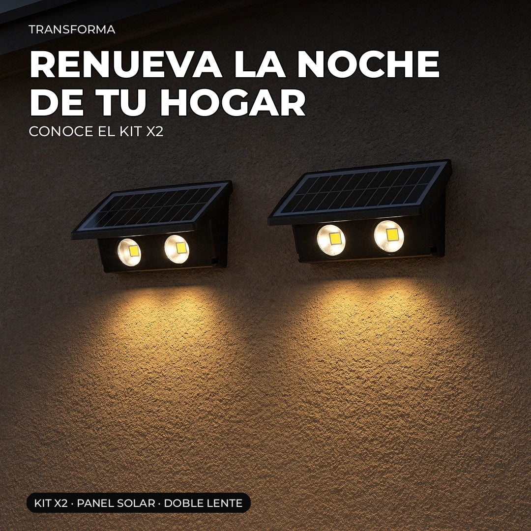Fachada nocturna renovada con apliques solares de pared